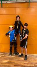 Sasha, Karan y Anatoli con las medallas conquistadas en la competición. Foto: Cedida