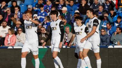 Jugadores del Valencia durante su último partido contra el Getafe. Foto: EFE