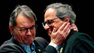 Els expresidents Artur Mas i Quim Torra. Foto: EFE