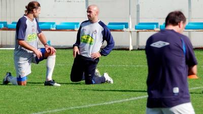 Pochettino e Iván de la Peña en un entrenamiento con el Espanyol. foto: efe