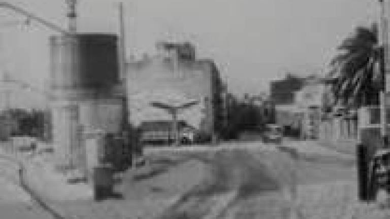 $!Una gasolinera en la calle Doctor Robert. en diciembre de 1962, cuando la nevada. FOTO: JAUME DOMINGO MULET