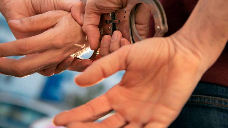 Imagen de archivo de una persona detenida por Mossos. Foto: CME